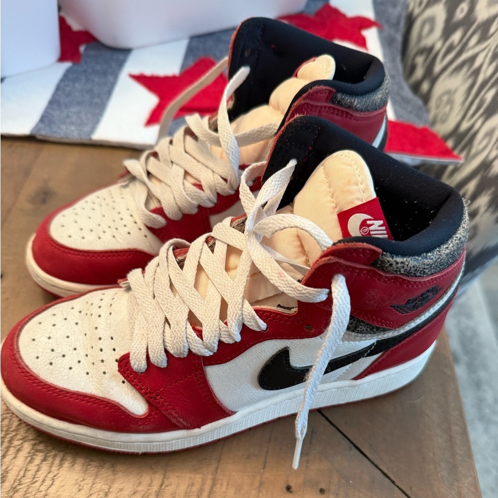 Nike Jordans Red and White Sneakers with Black Swoosh
